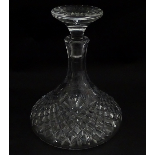 292 - A cut glass ships decanter. Approx. 9 3/4