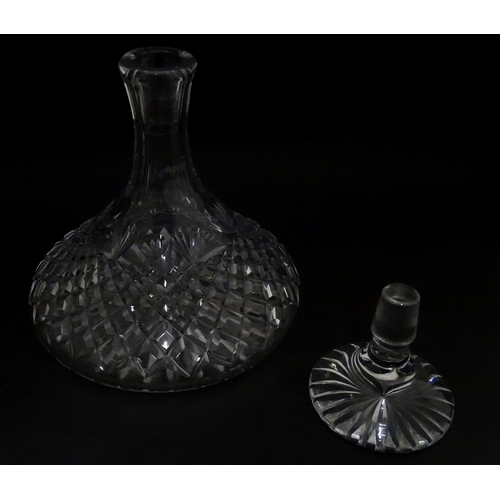 292 - A cut glass ships decanter. Approx. 9 3/4