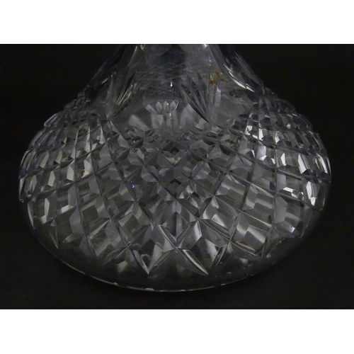 292 - A cut glass ships decanter. Approx. 9 3/4