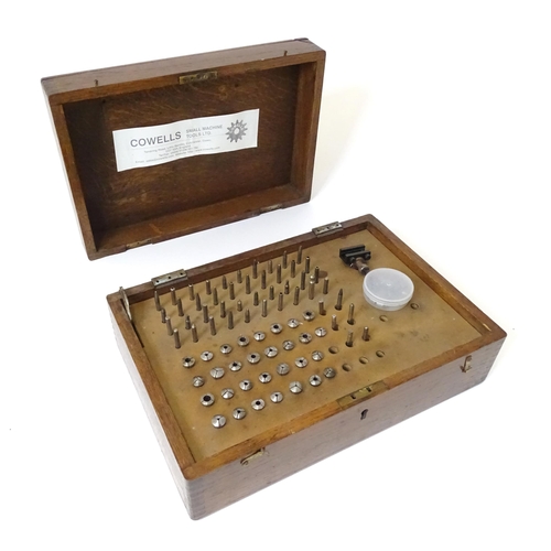 299 - Clock / Watchmakers / Repairers Interest : A cased set of  30 x 8mm collets.