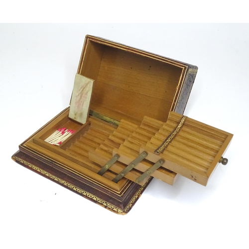 300 - An Italian leather covered and tooled cigarette box, opening to reveal a fitted interior. Box marked... 