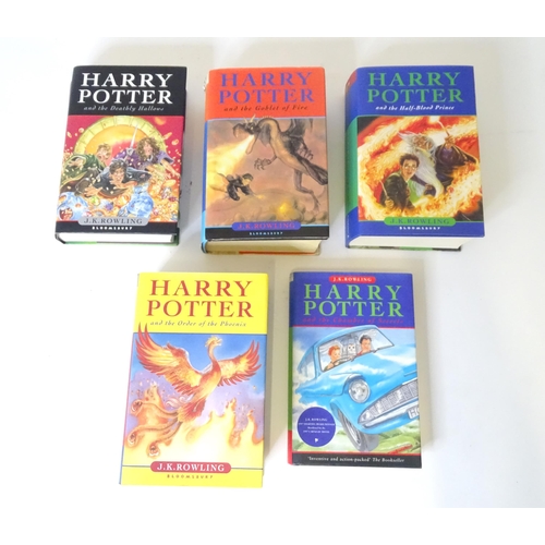 304 - Books: Five hardback Harry Potter books comprising The Chamber of Secrets, The Goblet of Fire, The O... 