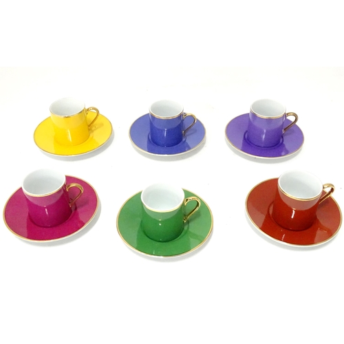 310 - A cased Silea multicoloured coffee / tea set. Boxed.