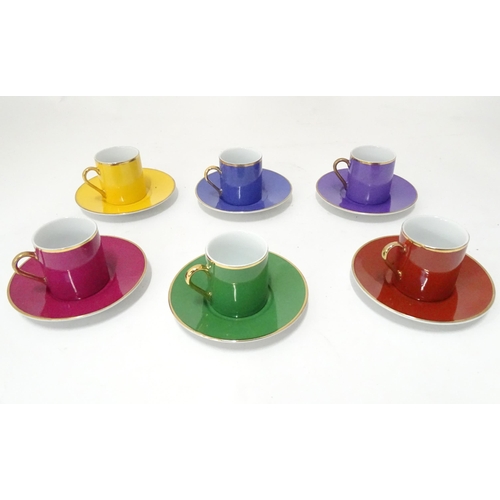 310 - A cased Silea multicoloured coffee / tea set. Boxed.