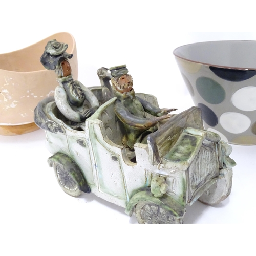 335 - A studio pottery model of a car with figures by Marie Whitby of Ashwell. Together with a Melin Tregw... 