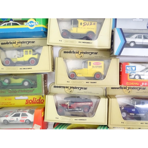 338 - Toys: A quantity of assorted die cast scale model cars / vehicles to include Corgi Toys VW Polo, Fia... 