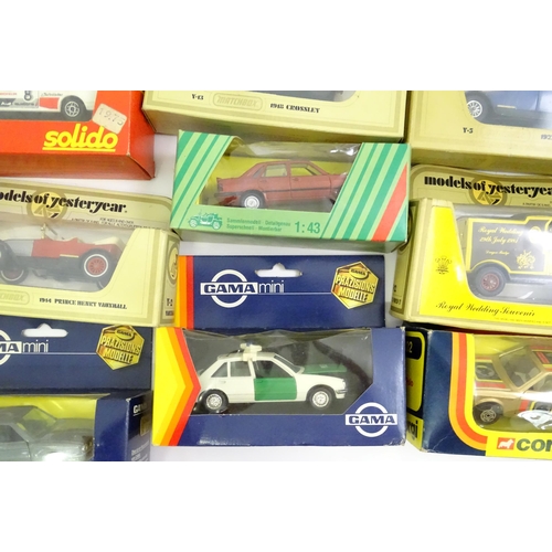 338 - Toys: A quantity of assorted die cast scale model cars / vehicles to include Corgi Toys VW Polo, Fia... 