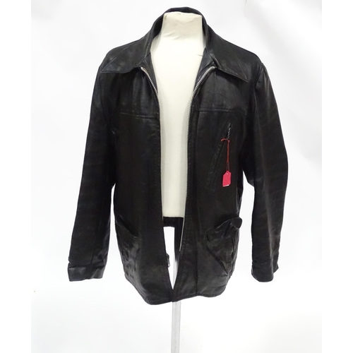 345 - Three men's vintage leather jackets comprising a Montgomery Ward zipped leather jacket,  chest measu... 