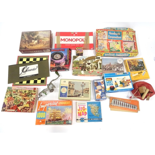 351 - Toys: A quantity of assorted jigsaw puzzles and board games to include Monopoly, Cluedo, Roulette, B... 