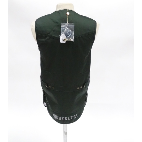 356 - Country clothing : a Beretta skeet vest / clay shooting waistcoat in black/green with silver piping,... 