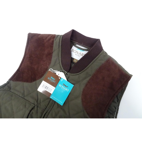 359 - Country clothing : a Bonart child's shooting gilet / waistcoat in olive green, diamond quilt with fa... 