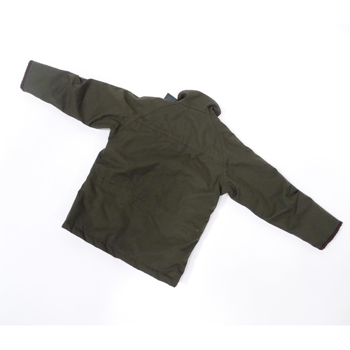 360 - Country clothing : a Bonart Keeper child's waterproof shooting jacket, in olive green, with handwarm... 