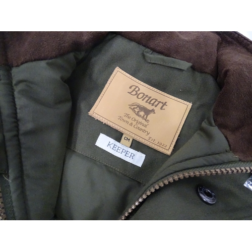 360 - Country clothing : a Bonart Keeper child's waterproof shooting jacket, in olive green, with handwarm... 