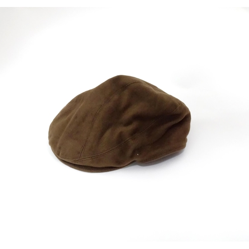 363 - Country clothing : a Laksen Sporting Broadlands moleskin bronze flat cap, size M (approx 57cm)