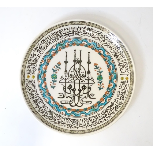 364 - A Turkish Kutanya / Kutahya plate with Iznik style decoration. Indistinctly marked under. Plate appr... 