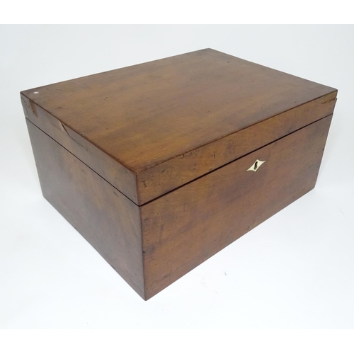 366 - A 20thC mahogany box opening to reveal a tray within. Approx. 7