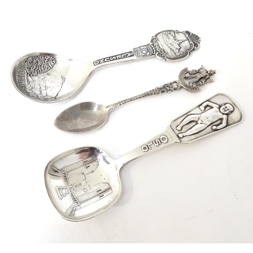 414 - Three Continental silver plate souvenir spoons to include one titled Oslo, Alesund, the other titled... 