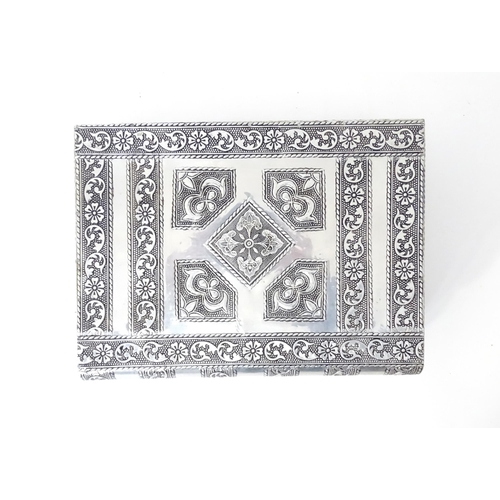 444 - An eastern style white metal jewellery box formed as two books,  with fitted sectional interior. Tog... 