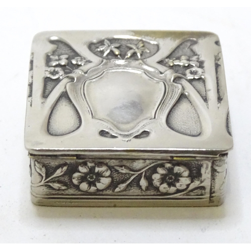 455 - A small silverplate box of squared form with embossed decoration. Approx. 1 1/2