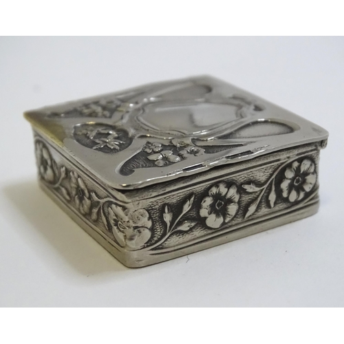 455 - A small silverplate box of squared form with embossed decoration. Approx. 1 1/2