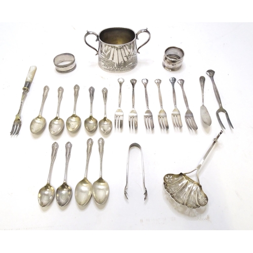 469 - A quantity of silver plate and white metal items to include sugar bowl, napkin rings, white metal st... 