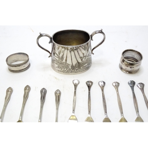 469 - A quantity of silver plate and white metal items to include sugar bowl, napkin rings, white metal st... 