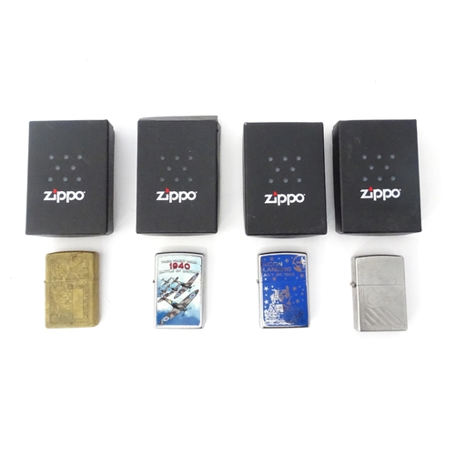 491 - Four boxed Zippo pocket lighters, including commemorative issues for the 1960 moon landing and the B... 