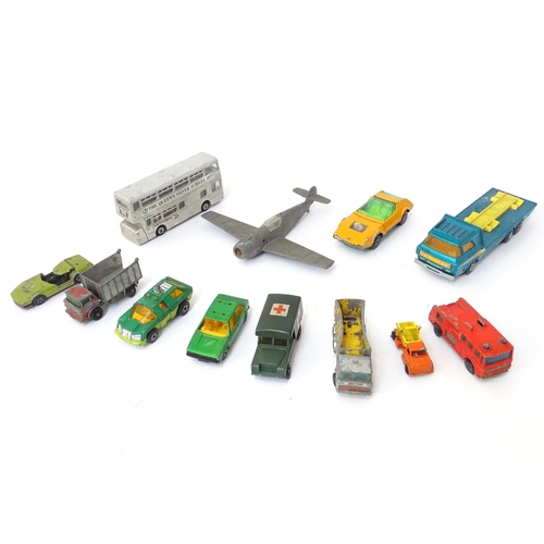 497 - Toys: A quantity of die cast scale model vehicles to include a Lesney Matchbox Merryweather Fire Eng... 