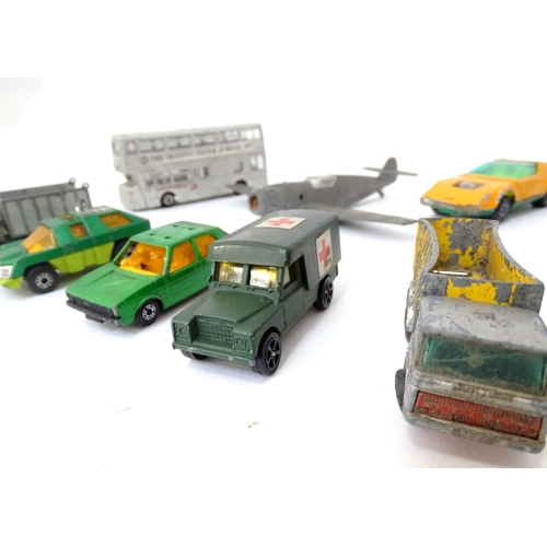 497 - Toys: A quantity of die cast scale model vehicles to include a Lesney Matchbox Merryweather Fire Eng... 