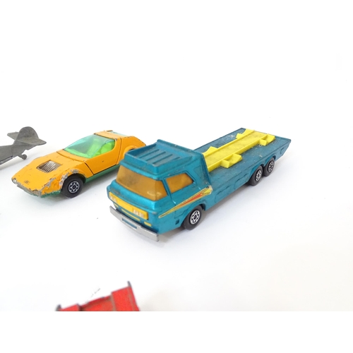 497 - Toys: A quantity of die cast scale model vehicles to include a Lesney Matchbox Merryweather Fire Eng... 