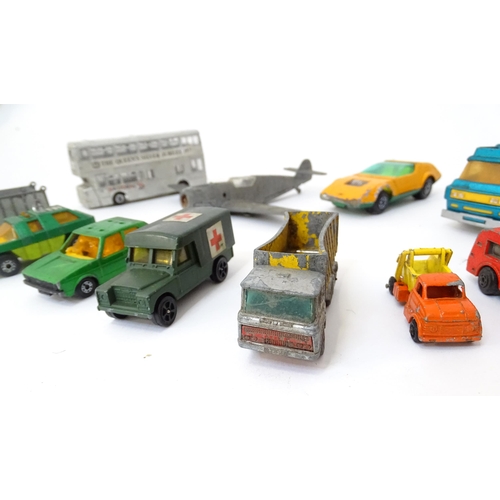 497 - Toys: A quantity of die cast scale model vehicles to include a Lesney Matchbox Merryweather Fire Eng... 