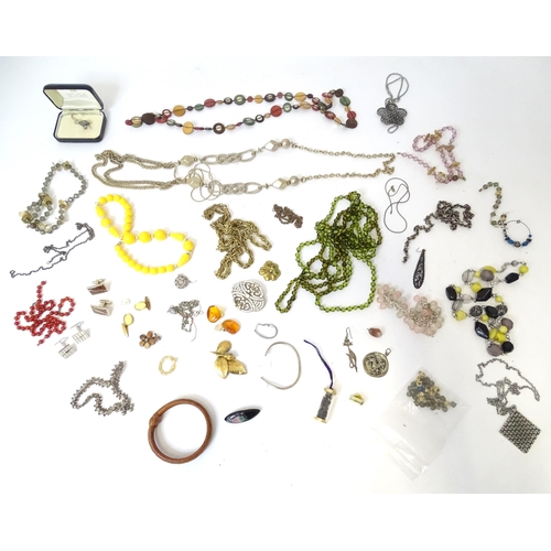 529 - A quantity of assorted costume jewellery to include bead necklaces, cufflinks, bracelets, brooches e... 