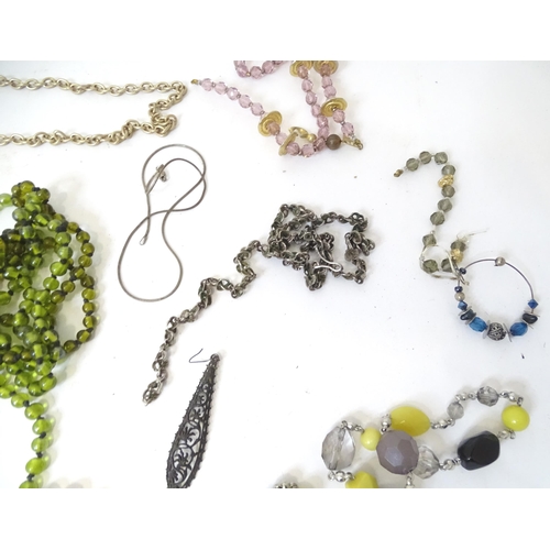 529 - A quantity of assorted costume jewellery to include bead necklaces, cufflinks, bracelets, brooches e... 