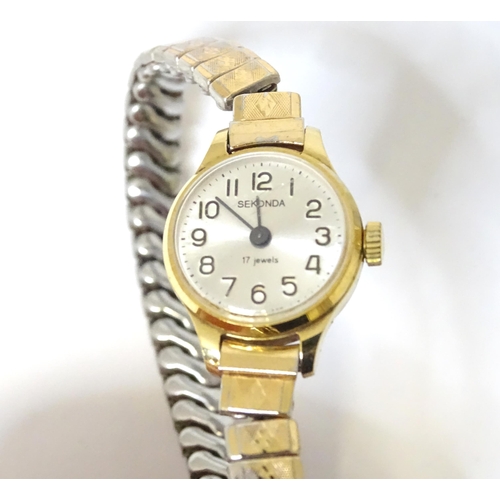 541 - Three gold plated ladies dress watches by Sekonda, Pulsar and Gradus.  (3)