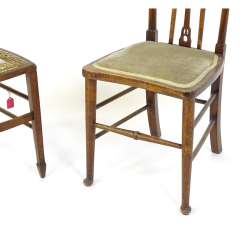 669 - Two Edwardian side chairs, one chair with Art Nouveau inlaid back splat and the other a cane seated ... 