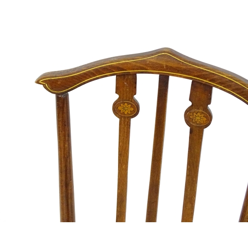 669 - Two Edwardian side chairs, one chair with Art Nouveau inlaid back splat and the other a cane seated ... 