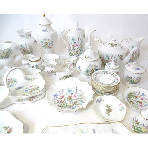 679 - A quantity of Aynsley tea wares in the Wild Tudor pattern to include tea pot, hot water pot, cups, s... 