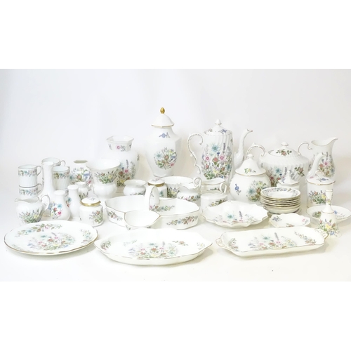 679 - A quantity of Aynsley tea wares in the Wild Tudor pattern to include tea pot, hot water pot, cups, s... 