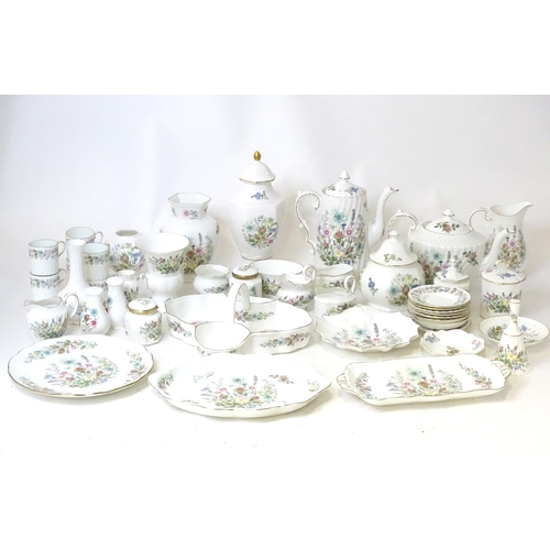 679 - A quantity of Aynsley tea wares in the Wild Tudor pattern to include tea pot, hot water pot, cups, s... 