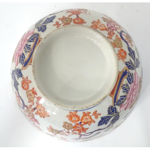 778 - An Oriental bowl decorated with flowers, foliage and birds. Approx. 4 3/4