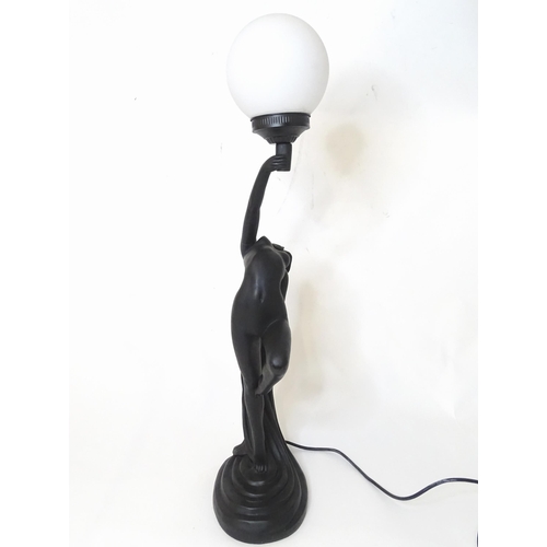 815 - An Art Nouveau style table lamp modelled as a female nude. Approx. 30 1/2