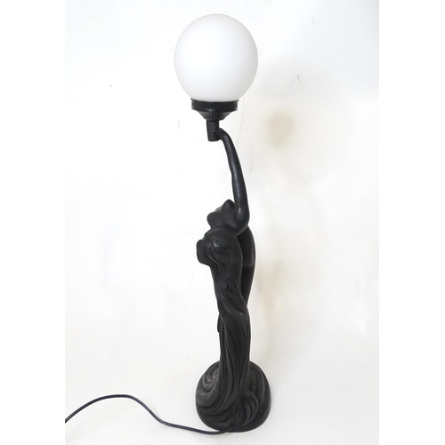 815 - An Art Nouveau style table lamp modelled as a female nude. Approx. 30 1/2