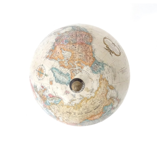 816 - A 20thC Replogle globe titled World Classic. Approx. 15