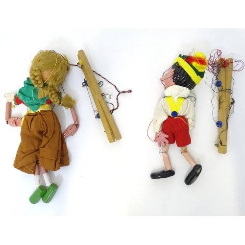 820 - Two Pelham Puppets with boxes, one modelled as Gretel, the other as Pinocchio (2)