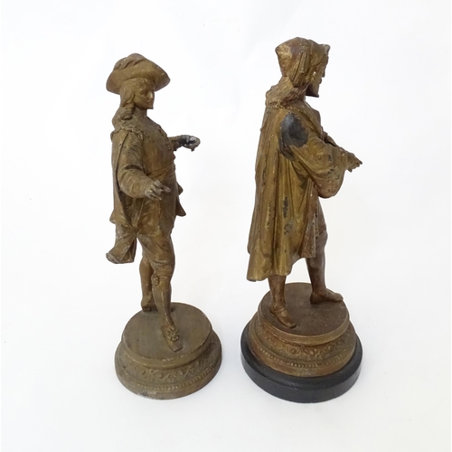 846 - Two 20thC cast figures to include an artist and a scholar. Largest approx. 11 1/2