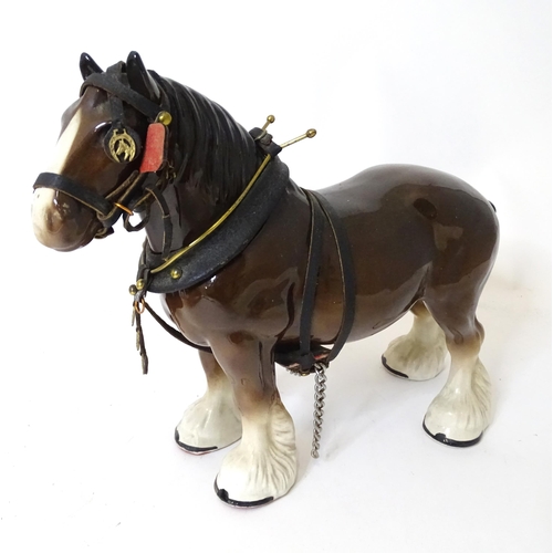 859 - A ceramic model of a dray horse with a wooden cart and barrels. Horse approx. 13 1/2