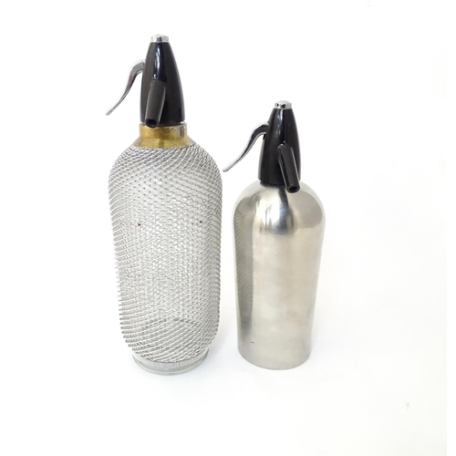 94 - Two mid to late 20thC soda siphons, the larger example with glass bottle and wire mesh cover, approx... 