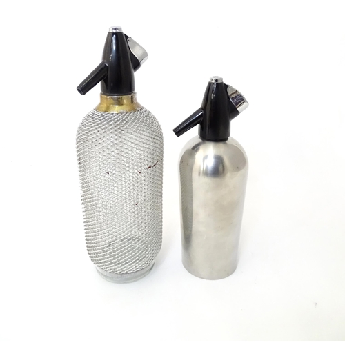 94 - Two mid to late 20thC soda siphons, the larger example with glass bottle and wire mesh cover, approx... 