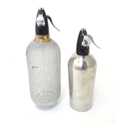 94 - Two mid to late 20thC soda siphons, the larger example with glass bottle and wire mesh cover, approx... 