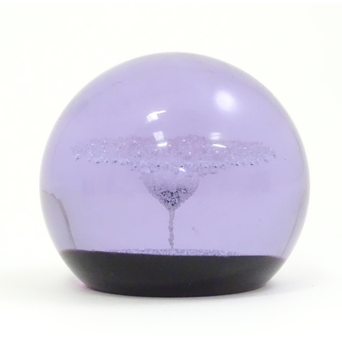 108 - A limited edition Caithness paperweight titled Ice Fountain, no. 521 / 1500, boxed with certificate.... 